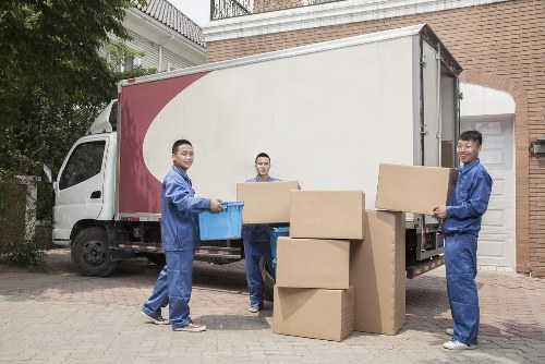 Packed moving boxes and furniture ready for a Westminster house relocation