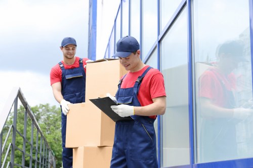Local moving team handling furniture in central Westminster