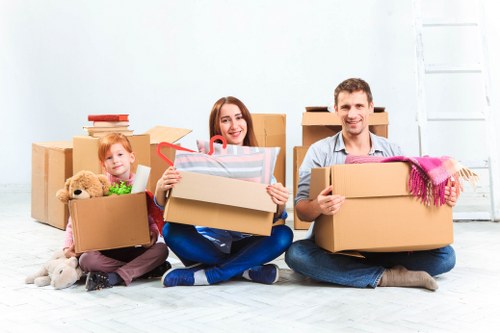 Furniture being carried through a Westminster residential building