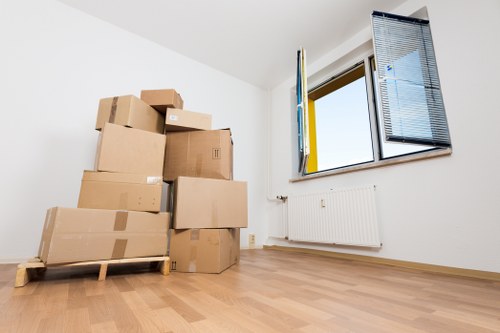Professional movers handling household items during a Westminster relocation