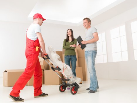 Local removal company crew loading boxes and household items for a Westminster relocation